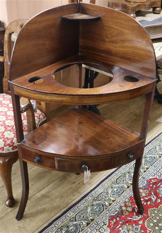 A George III mahogany corner washstand W.72cm